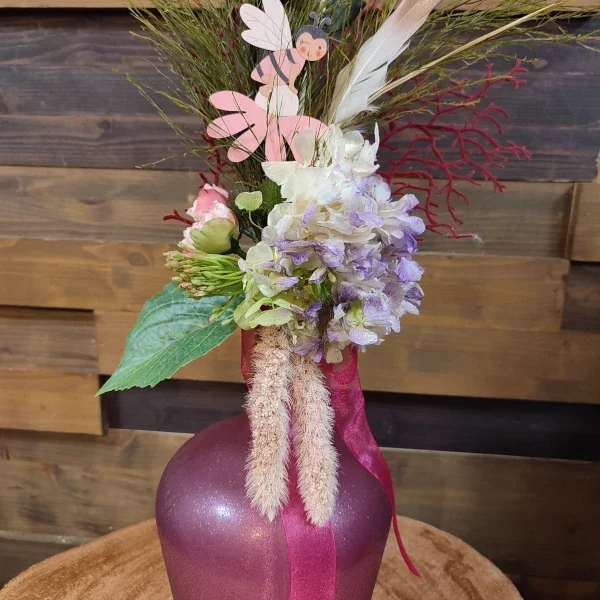 Botella floral rosa